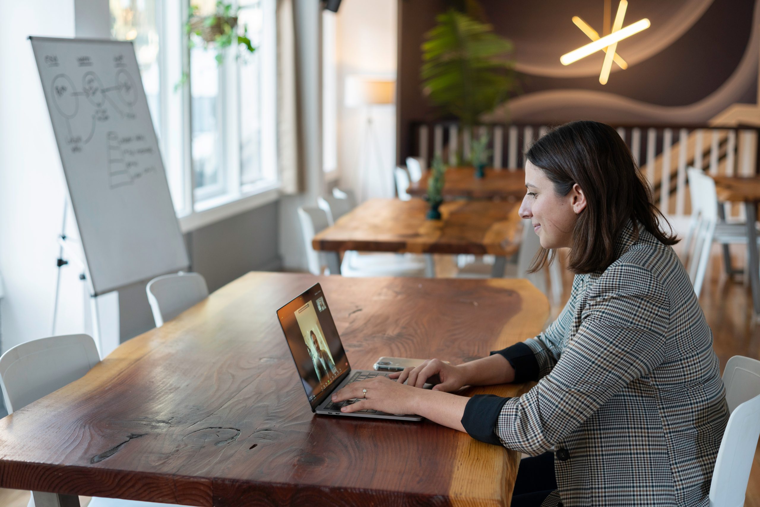 Women looking at laptop and smiling