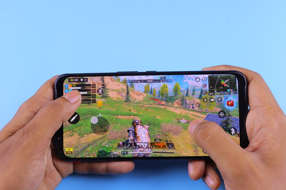 person playing Call of Duty on a smartphone
