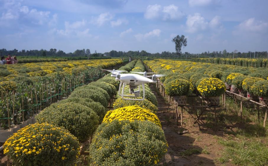a drone flying over a farm