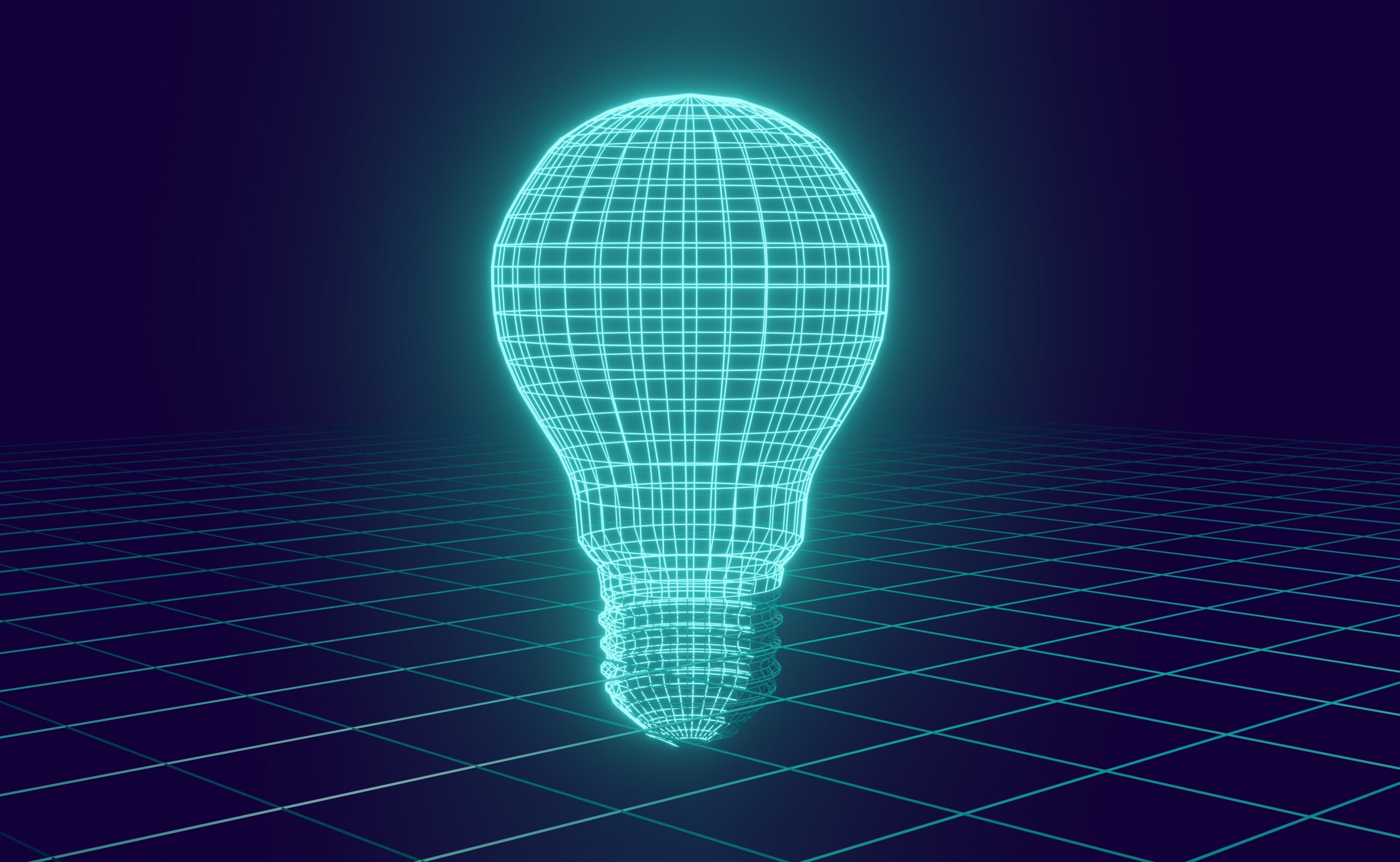 A glowing light bulb in a dark room